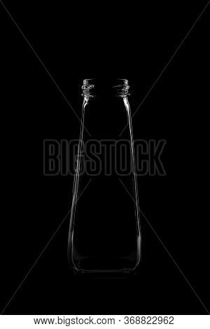 Silhouette Of A Bottle With A Beautiful Shape On A Black Background