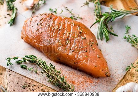 Raw Meat In The Marinade. Marinated Chicken Breast With And Rosemary. Sottilissime Raw Fillet With A