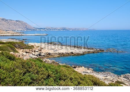 Rocky Coast With Transparent Water Near Glistra And Lardos Beach On The Island Of Rhodes, Greece