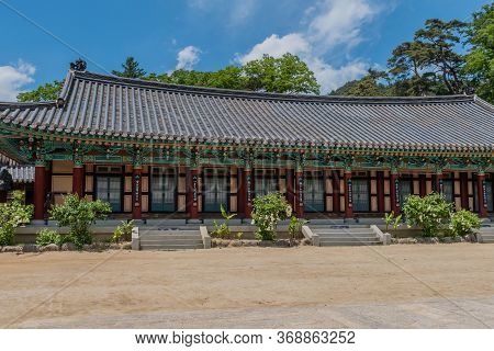 Haeinsa-gil, South Korea; May 26, 2020: Haeinsa Temple Building With Ceramic Tiled Roof Under Beauti