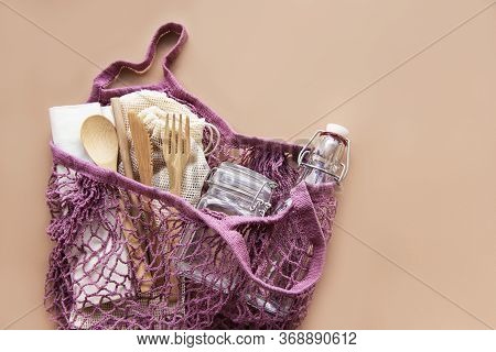 Cotton Bags, Net Bag With Reusable  Glass Jars, Bamboo And Wooden Cutlery. Zero Waste Concept. Eco F