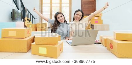 Young Asian Women Happy After New Order From Customer. Surprise And Shock Face Of Asian Woman Succes