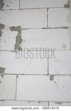 A Fragment Of A Modern Wall Made Of Gas Silicate Blocks. The Process Of Laying Blocks.