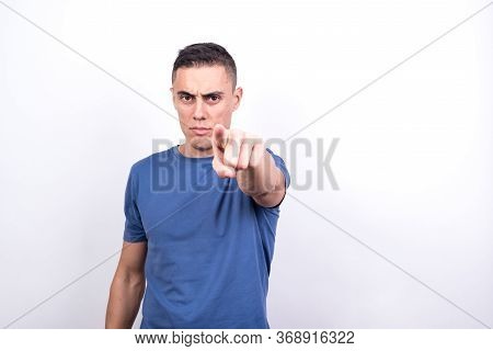 Man Pointing In Front With Index Finger