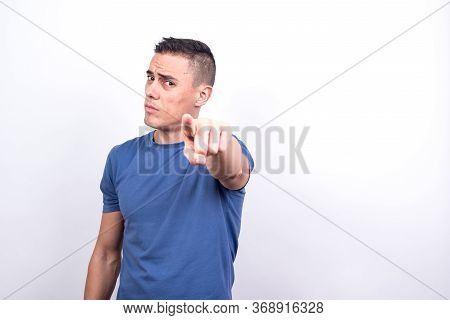 Man Pointing In Front With Index Finger