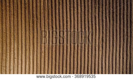 Aerial View ; Rows Of Soil Before Planting. Furrows Row Pattern In A Plowed Field Prepared For Plant