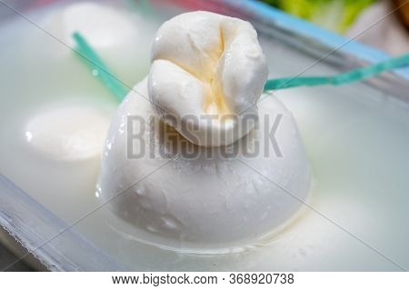 Fresh Handmade Soft Italian Cheese From Puglia, White Balls Of Burrata Or Burratina Cheese Made From