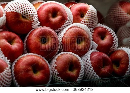 Close Up View Of Fruits Shelf In Supermarket. Apple Background