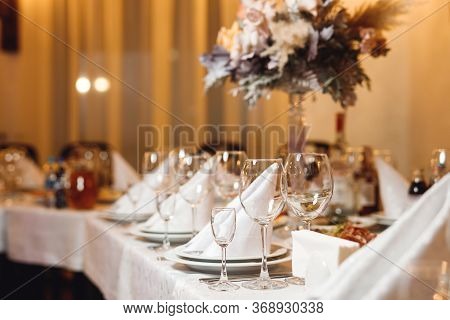 Wedding Table Setting With Empty Wine Glasses