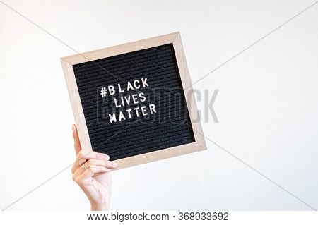 Hands Holding A Felt Letter-board With Word Black Lives Matter And I Cantt Breathe