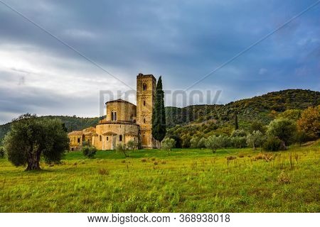 Ancient medieval magnificent abbey of San Antimo. Picturesque Tuscany. The concept of active, rural and photo tourism