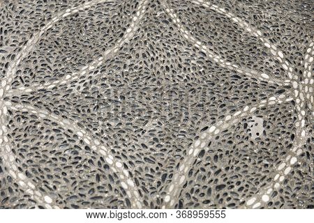 Closeup Detail Of The Decorative Pebblestone Pathway