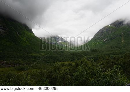 Rough Mountain Sides Around The Trollstigen Mountain Pass That Twists Through 11 Hairpin Bends Up Th