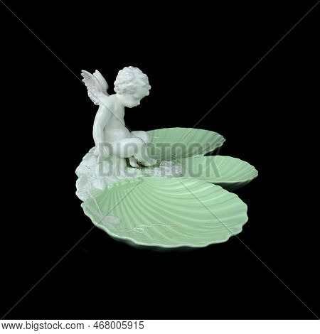 Beautiful Vase With A Flower Pattern On A Black Isolated Background. Antique Porcelain Vase With Pai