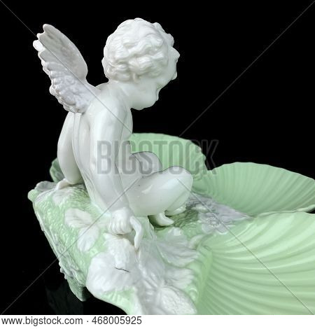 Beautiful Vase With A Flower Pattern On A Black Isolated Background. Antique Porcelain Vase With Pai