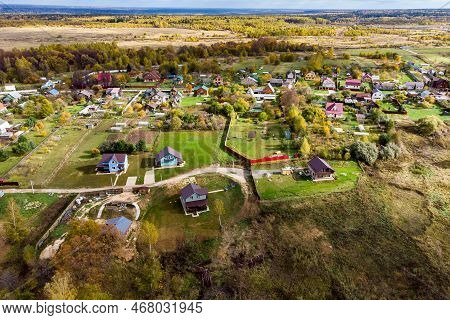Aerial View Of A Rural Building Surrounded By A Colorful Autumn Landscape. Karpovo Village, Maloyaro