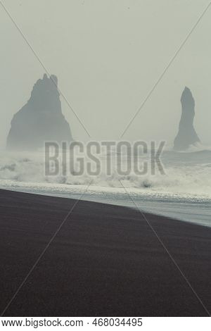Foamy Waves And Cliffs Landscape Photo. Beautiful Nature Scenery Photography With Fog On Background.