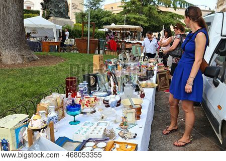 Altamura, Italy - June 4, 2017: People Visit Flea Market In Altamura, Italy. Variety Of Trinket And 