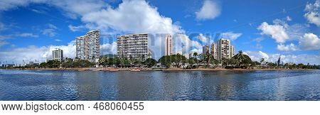 Ala Wai Canal, Condos, Canoe Launch And Coconut Trees On A Nice Day On Oahu, Hawaii With Mountains I