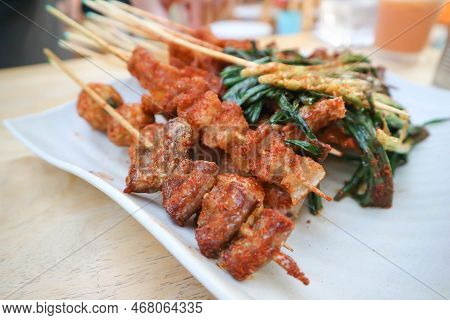 Barbecued Pork Or Grilled Pork , Grilled Chitterlings Or Fried Chitterlings Or Chinese Food