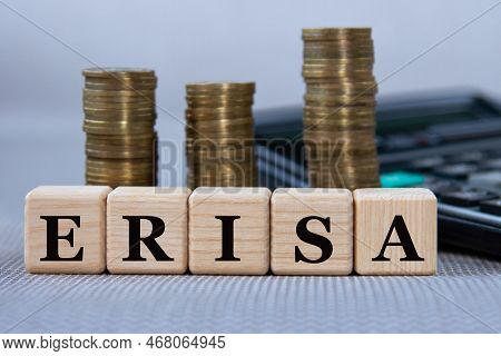 Erisa (employee Retirement Income Security Act) - Acronym On Wooden Cubes On The Background Of Coins