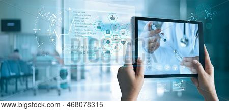 Virtual Doctor Concept, The Patient Holds A Tablet. Consult And Receive Advice And Analysis Health F