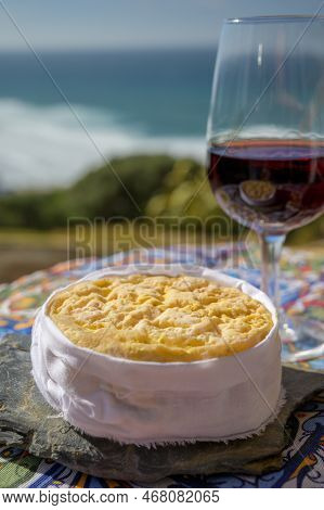 Tasting Of Tawny Porto Wine And Local Portuguese Matured Cheese Queijo Serpa With View On Blue Atlan