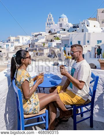 Couple Of Men And Women On Vacation In Santorini Greece, Couple Visit Oia Santorini, Pyrgos Village