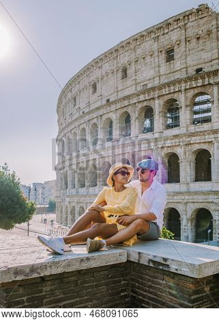 Couple Visit The Colosseum In Rome At A Citytrip In Rome Italy, Europe