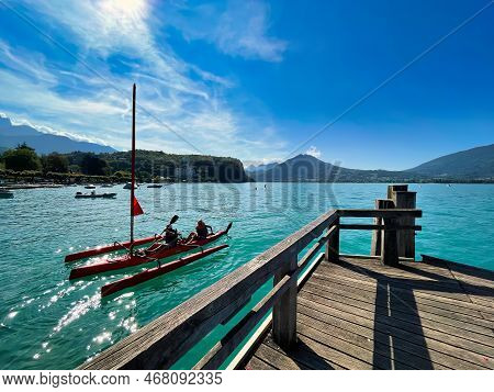 Menthon Saint Bernard, France - September 12 2021 : People On A Kayak Boat Are Peddeling In The Harb