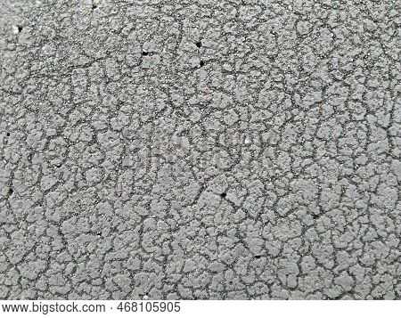 Closeup Gray Concrete Tiles Roof. Closeup Texture. Gray Background