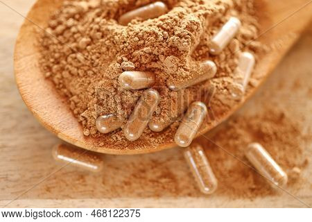 Transparent Capsules With Guarana Powder.alternative Medicine . Guarana Capsules In Guarana Powder I