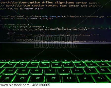 A Computer Program Code That Is Often Used. Computer Language Source Code In The Laptop With Flashin