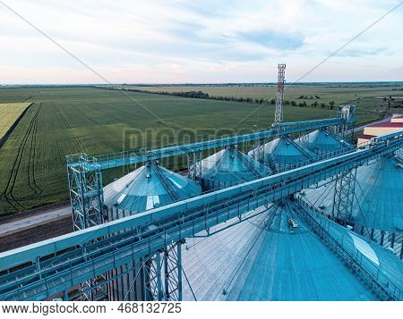 Grain Elevator. Metal Grain Elevator In Agricultural Zone. Agriculture Storage For Harvest. Grain Si