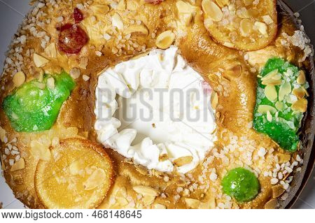 Roscón. Roscon De Reyes. Kingcake. Bun Made With A Sweet Dough In The Shape Of A Toroid Decorated Wi