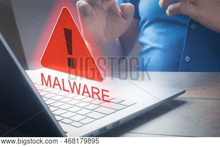 Hand Using Laptop And Show Malware Screen. Hack Password And Personal Data. . Person Looking At Lapt