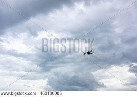 Drone Copter Flying With Digital Camera. Drone With High Resolution Digital Camera. Flying Camera Ta