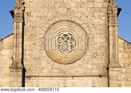 Rosette Window In The Facade Of The Medieval Main Church Of Our Lady Of The Assumption In Caminha, P
