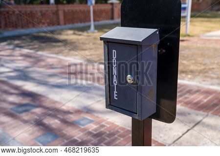 Metal Donation Box Set Up Outside For Anyone Who Wants To Contribue To Charity