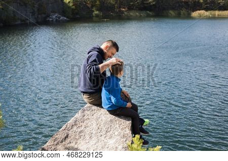 Happy Family. Father Playing With Son  Oudoors. Positive Human Emotions, Feelings, Joy On The Lake  