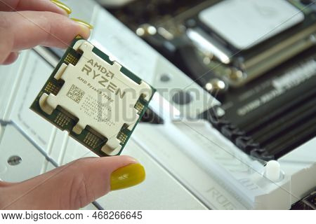 Close-up Of An Amd Ryzen 9 3900X Processor Installed On A Motherboard Asus Rog Strix X670E