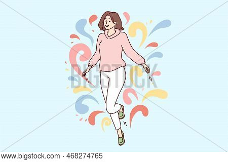 Woman Walks In Weightlessness And Waves Arms Located Among Multi-colored Drops Flying In Different D