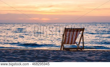 Beach Chair On The Beach With Palm Trees During Sunset At Na Jomtien Beach Pattaya Thailand