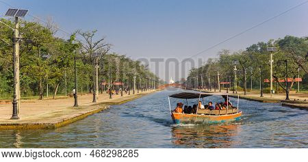 Lumbini, Nepal - November 09, 2019: Panorama Of A Motorboat On The Canal Of The Mayadevi Temple In L