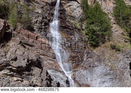 Foaming Jets Of Mountain Alpine Lillaz Waterfall (cascate Di Lillaz) Rush Down Granite Rapids, In Gr