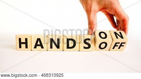 Hands On Or Off Symbol. Concept Words Hands On Hands Off On Wooden Cubes. Businessman Hand. Beautifu