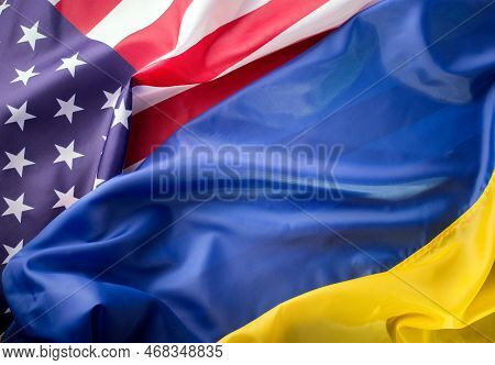 United States Of America And Ukrainian Flags Together On One Picture. Ukraine And Us Partnership Dur