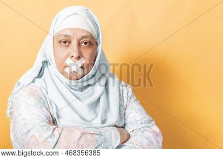 Adult Muslim Woman Wearing Muslim Hijab Waiting For Women Rights.