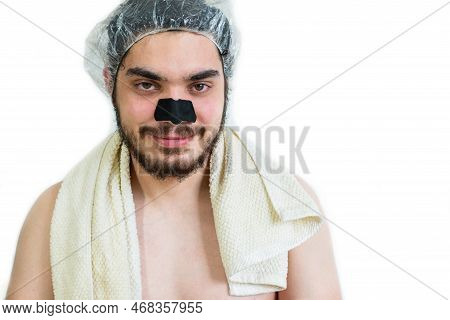 Young Caucasian Man Doing Facial Cleansing, Removing Pores Or Black Heads On Nose