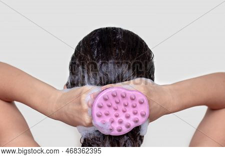 Hair Growth Stimulating, Scalp Massage.woman Use Massager Shampoo Brush